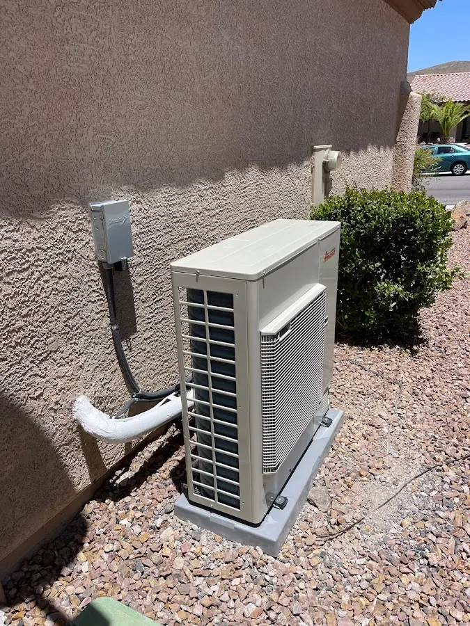 Residential air conditioning condenser unit in Gladstone